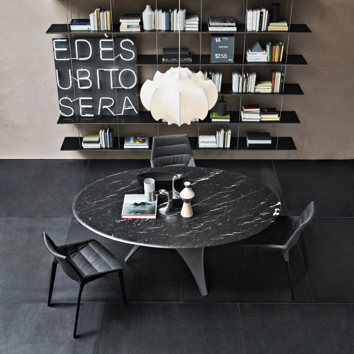 Arc table by Foster+Partners and Graduate bookshelf by Jean Nouvel 