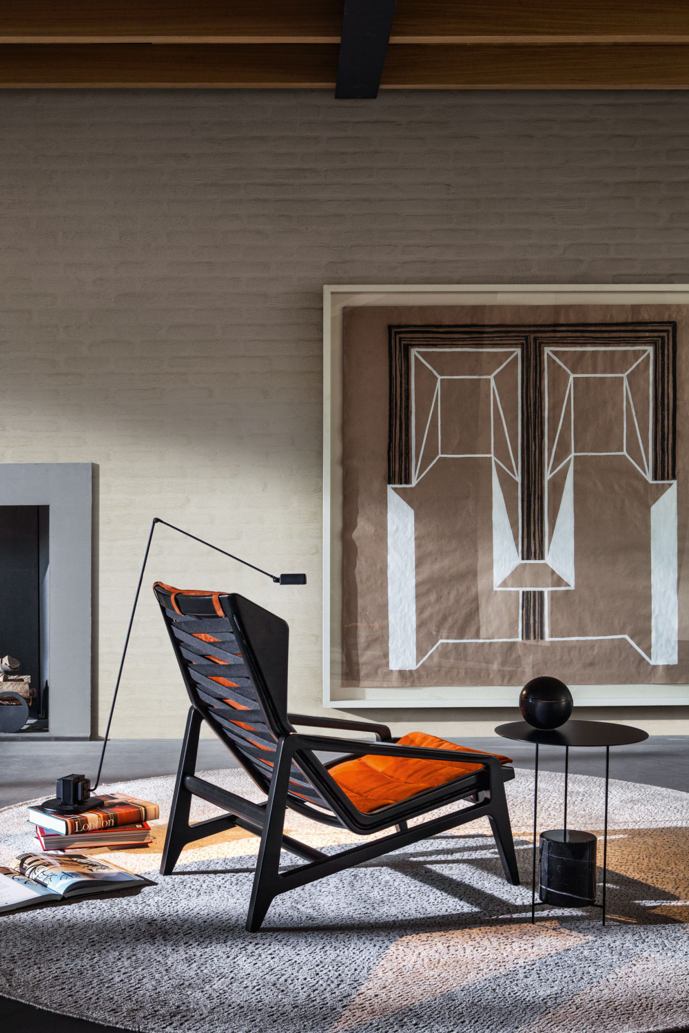Black wooden frame armchair with orange fabric 