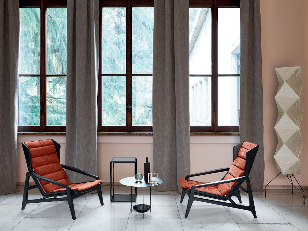 Black wooden frame armchairs with orange fabric 