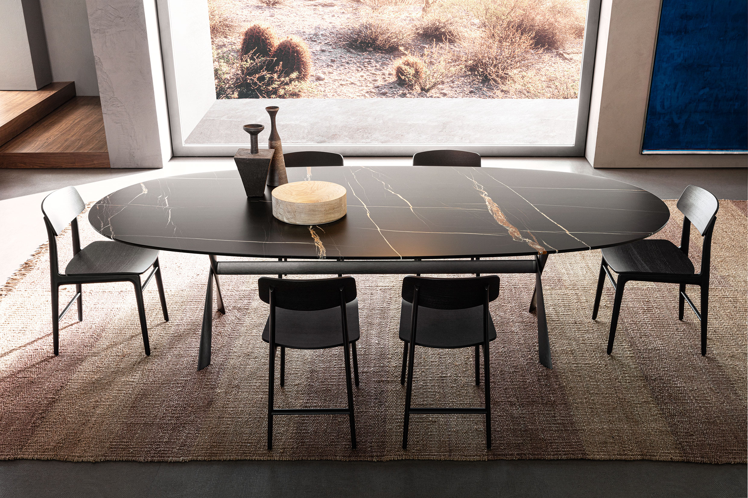 black marble table with black lacquered chairs
